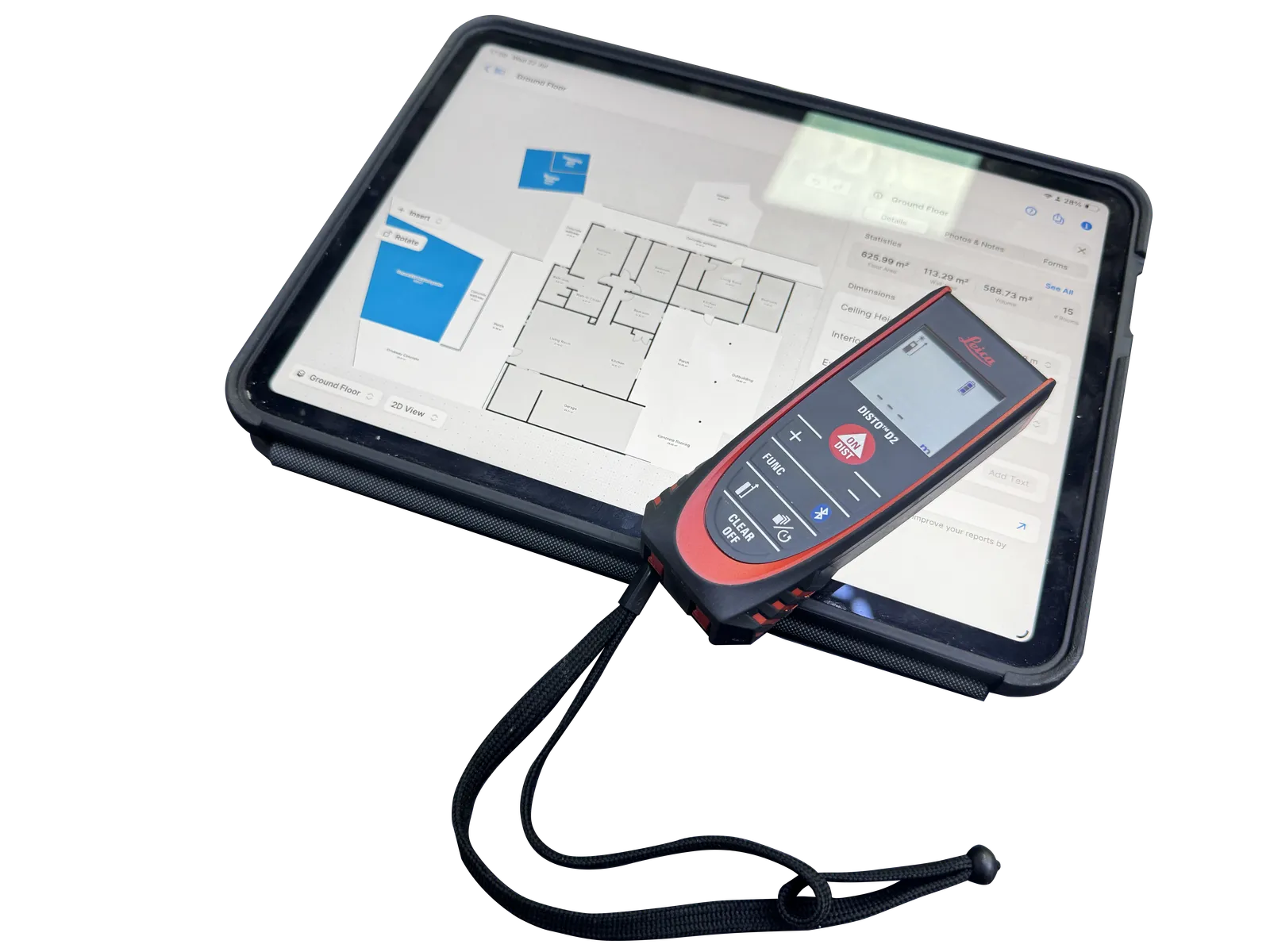 An iPad running SIGMA-CMS floor-plan capture beside a Leica DISTO laser measure on an inspection.